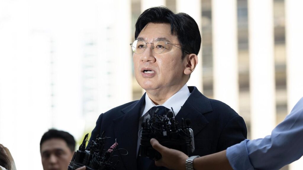 South Korean police seek to arrest K-pop mogul behind BTS
