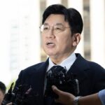South Korean police seek to arrest K-pop mogul behind BTS